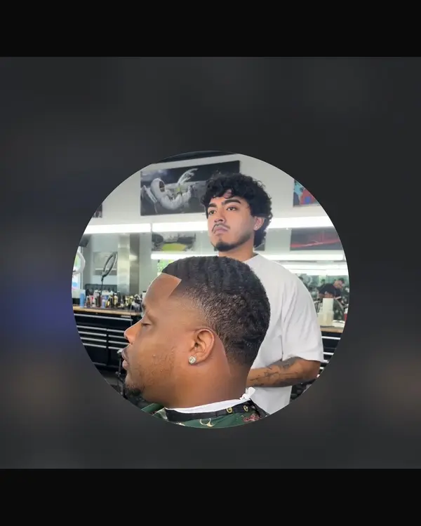 Kevin Mora, barber at One For All Barbershop