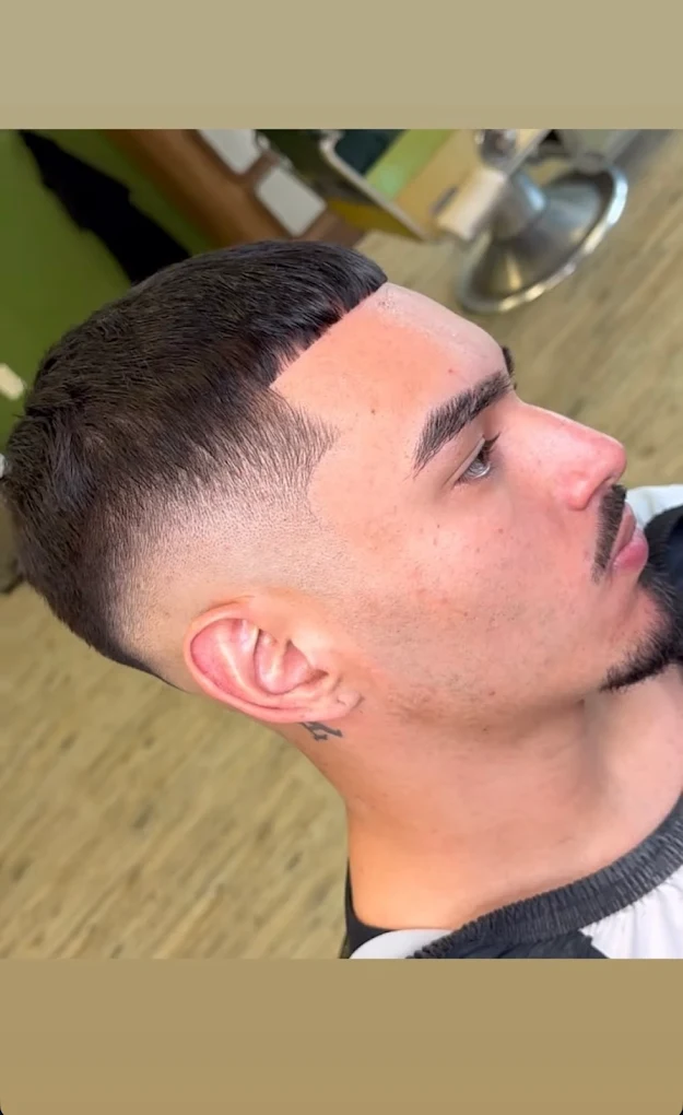 Buzz cut at One For All Barbershop