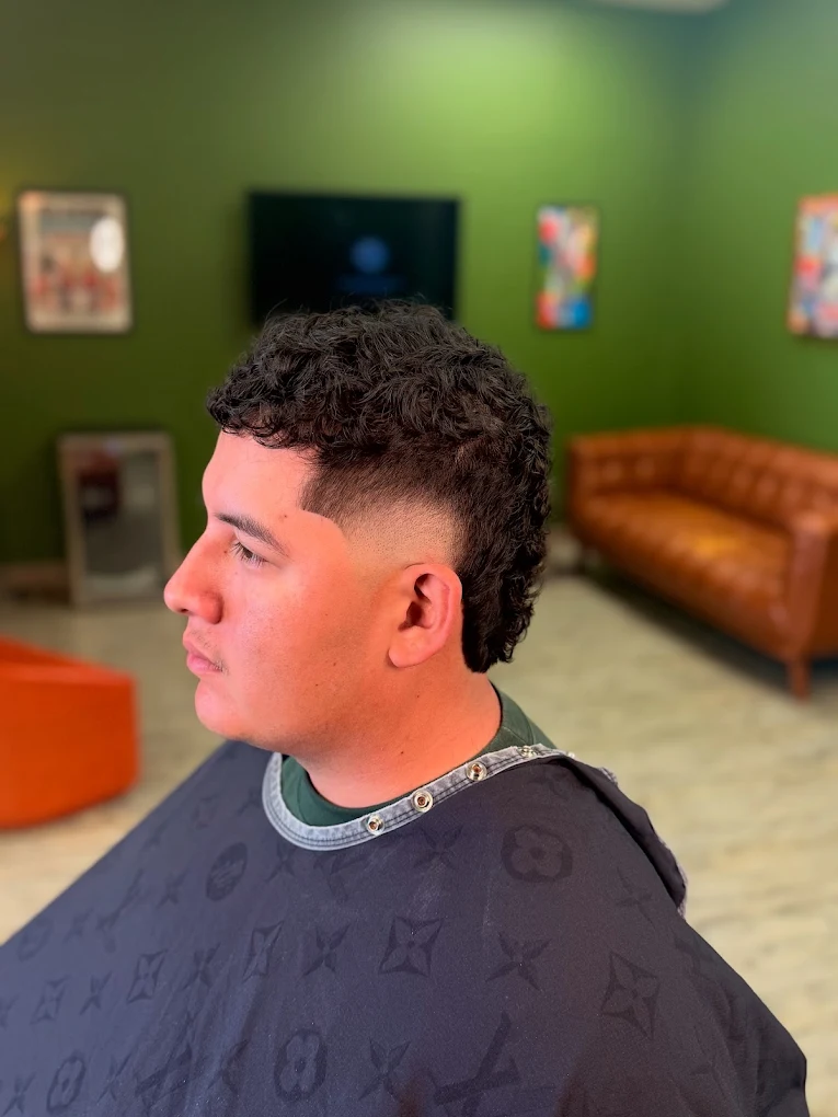 Curly textured cut at One For All Barbershop