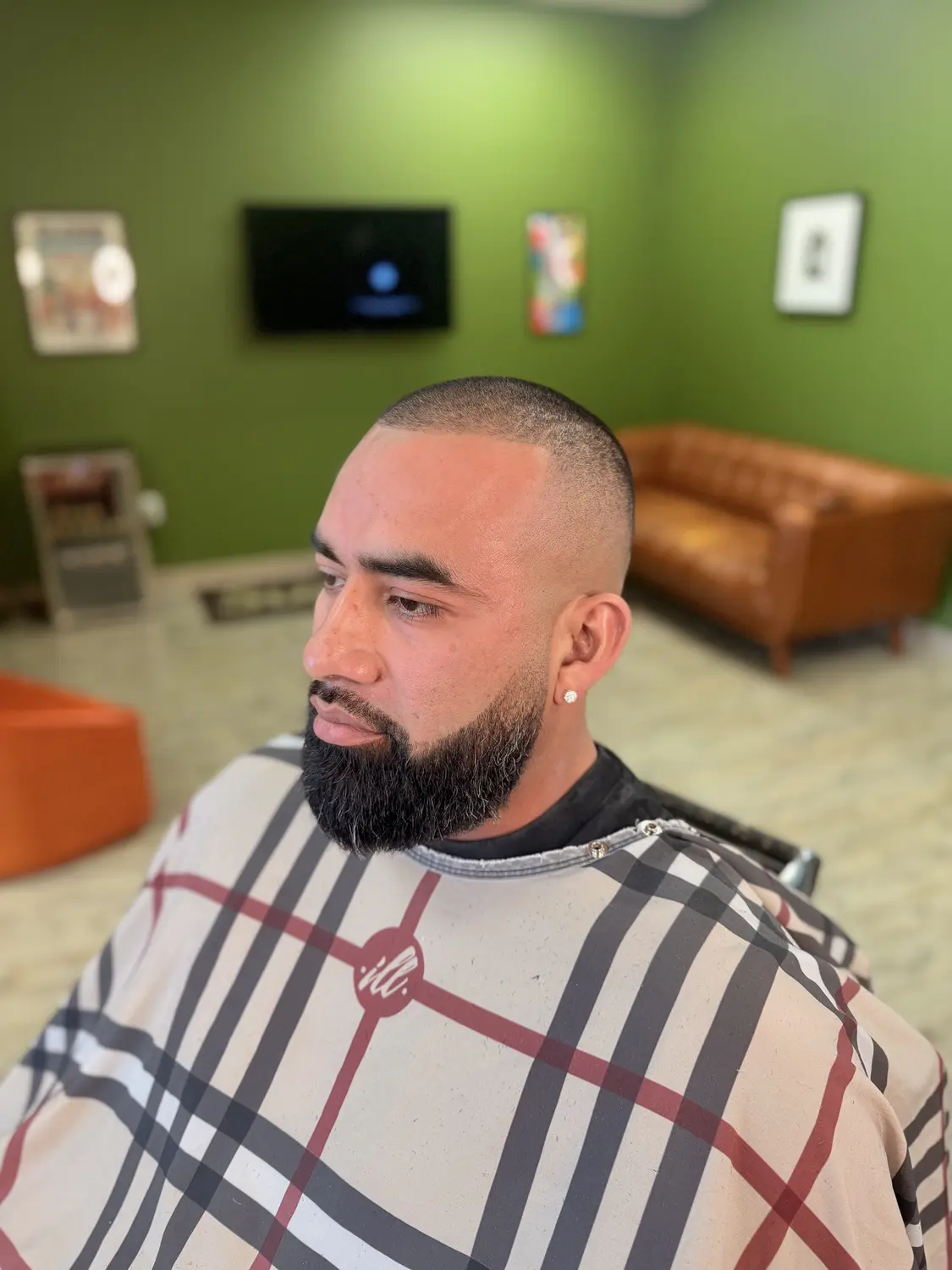 Skin fade with full beard at One For All Barbershop