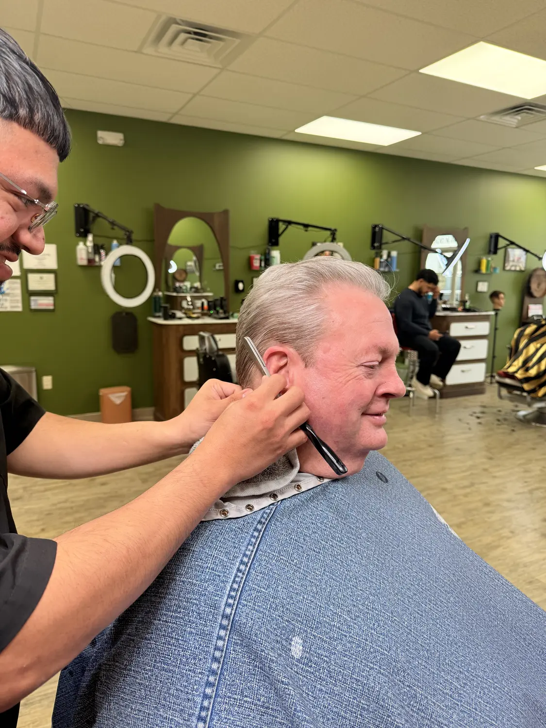 Straight razor edge-up at One For All Barbershop