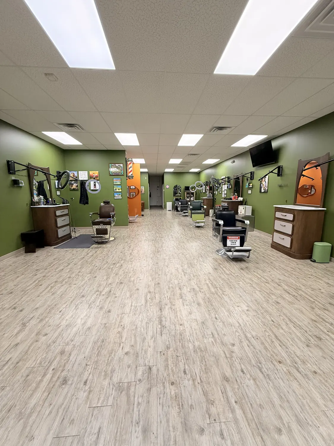 The floor at One For All Barbershop